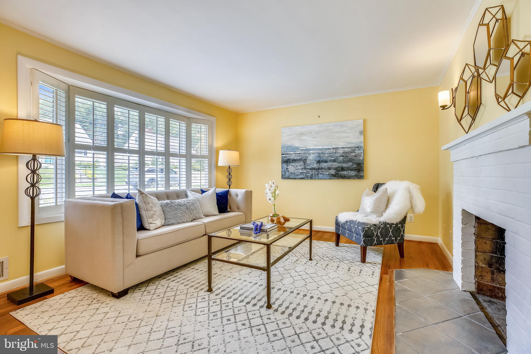 1008 Robin Road Silver Spring, MD 20901 - Photo 2 of 36 Large living room w/bat window & fireplace