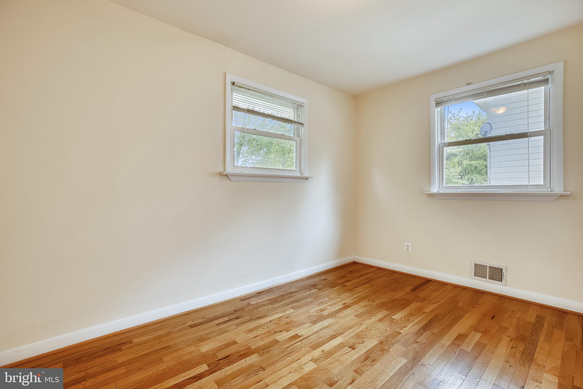 1008 Robin Road Silver Spring, MD 20901 - Photo 13 of 36 Versatile main level primary suite w/hardwoods