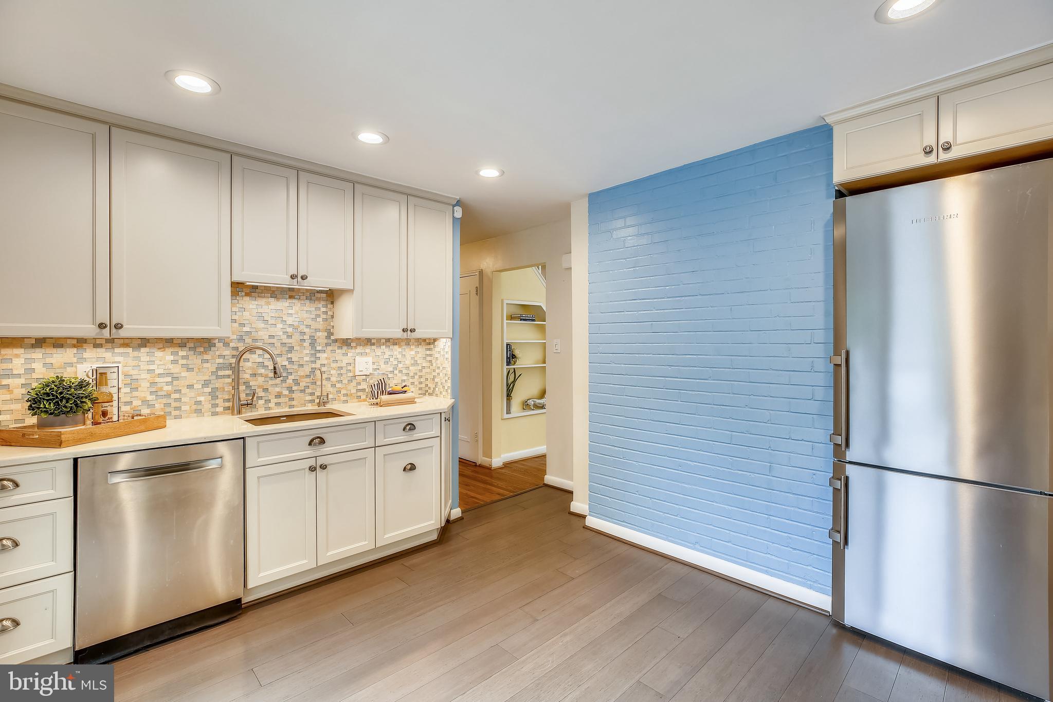 1008 Robin Road Silver Spring, MD 20901 - Photo 4 of 36 Custom backsplash and stainless appliances