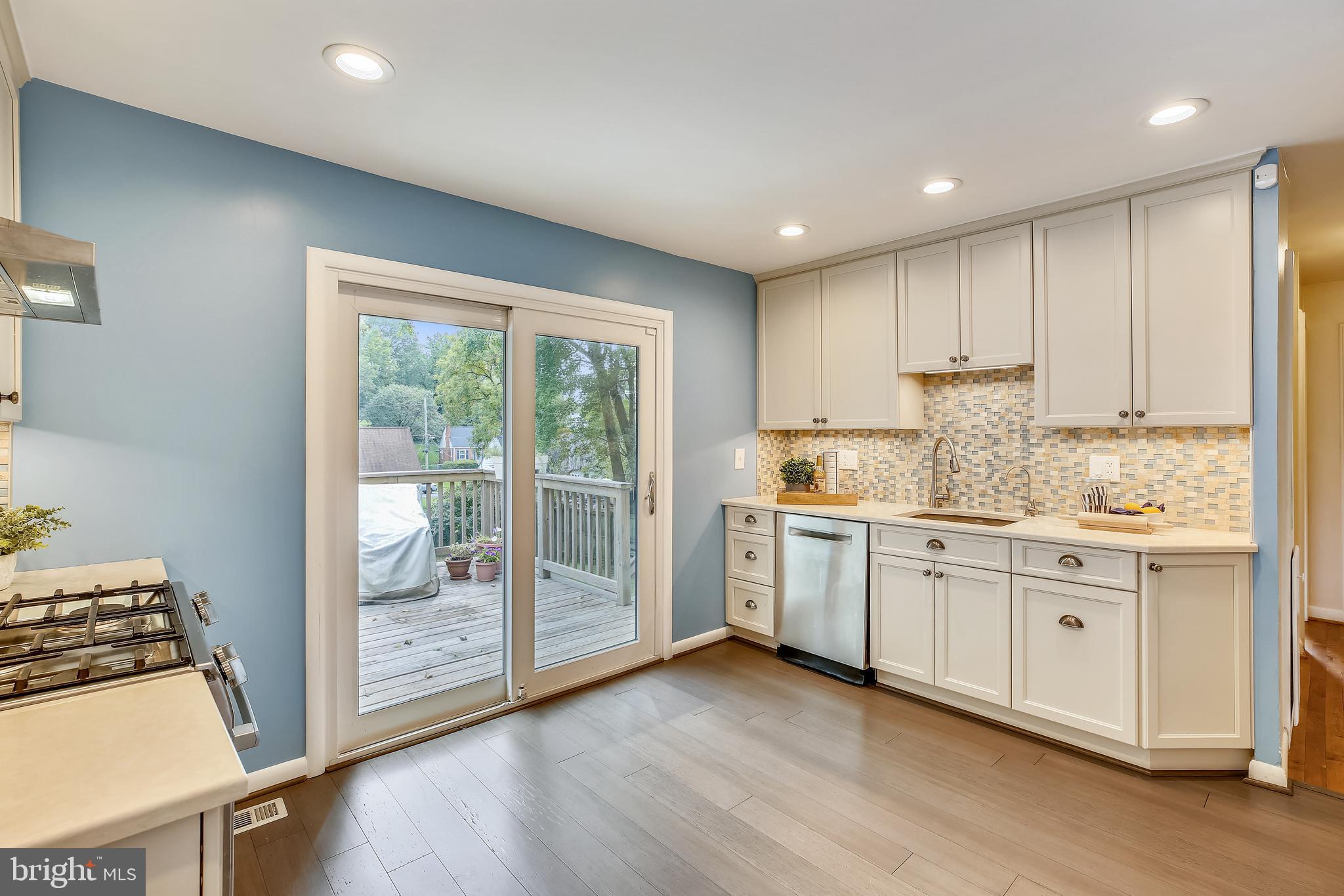 1008 Robin Road Silver Spring, MD 20901 - Photo 6 of 36 Sliding doors to deck lend abundant natural light