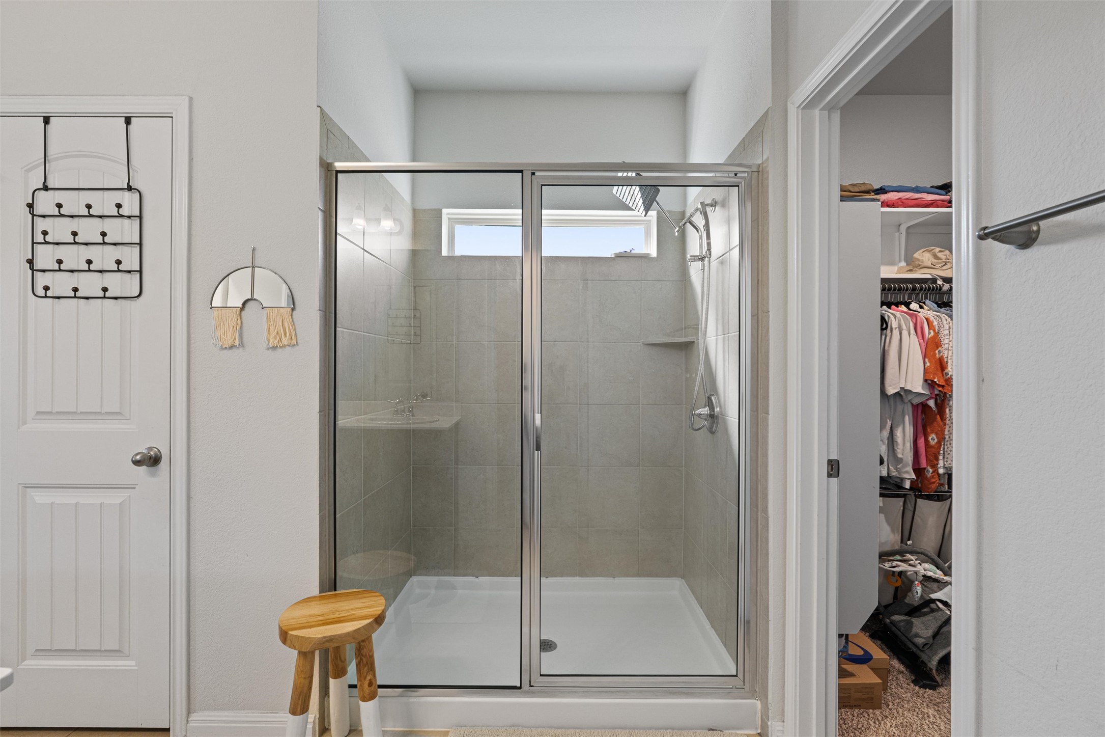 137 Red Sun Drive Kyle, TX 78640 - Photo 15 of 38 a bathroom with a shower