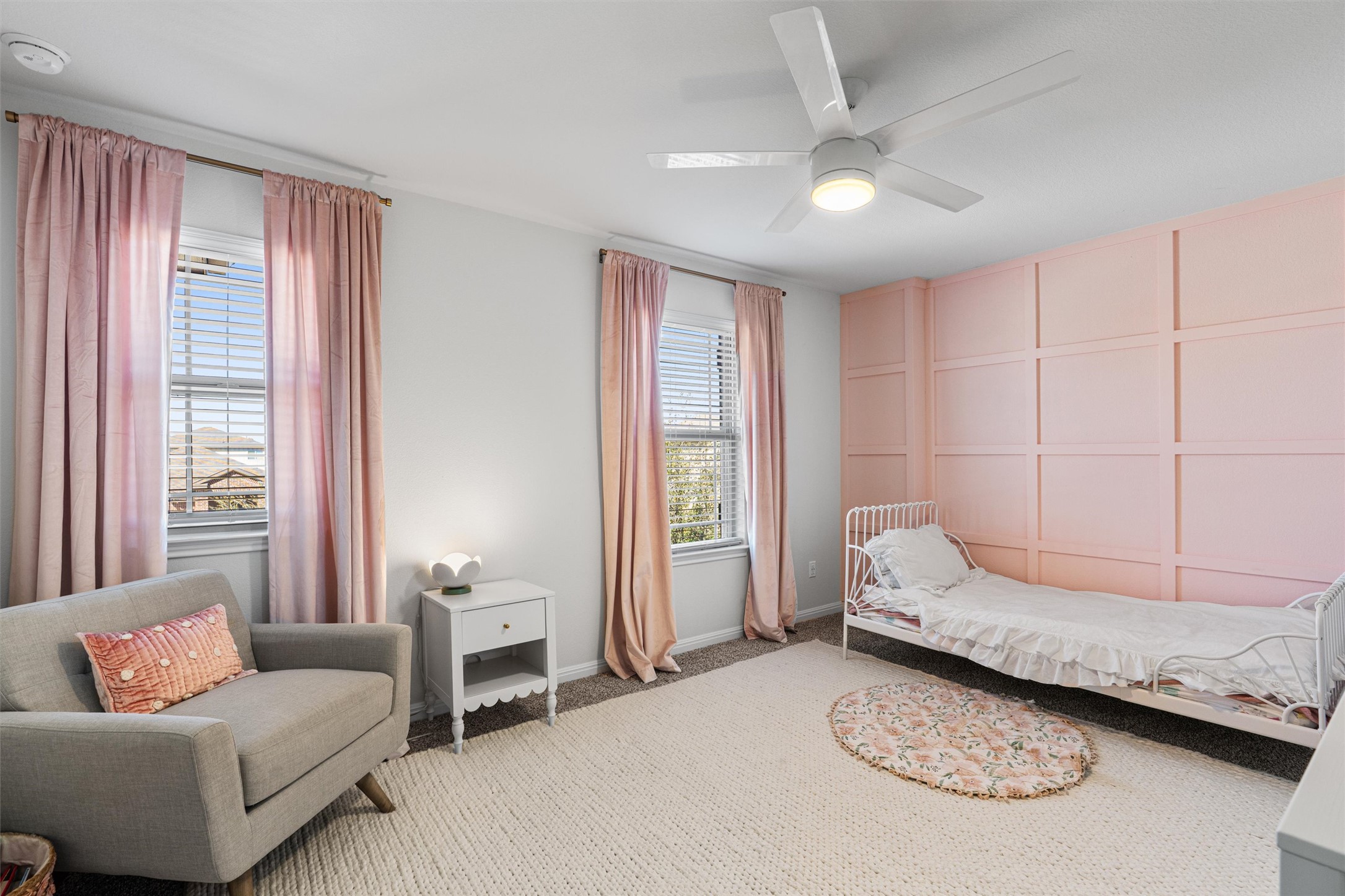 137 Red Sun Drive Kyle, TX 78640 - Photo 26 of 38 a bedroom with furniture and a window