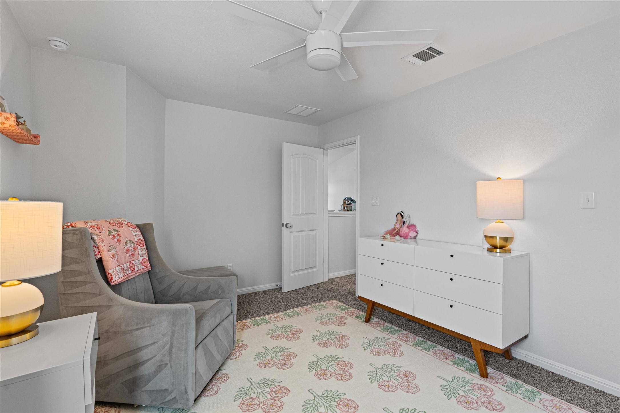 137 Red Sun Drive Kyle, TX 78640 - Photo 31 of 38 a room with furniture and a couch