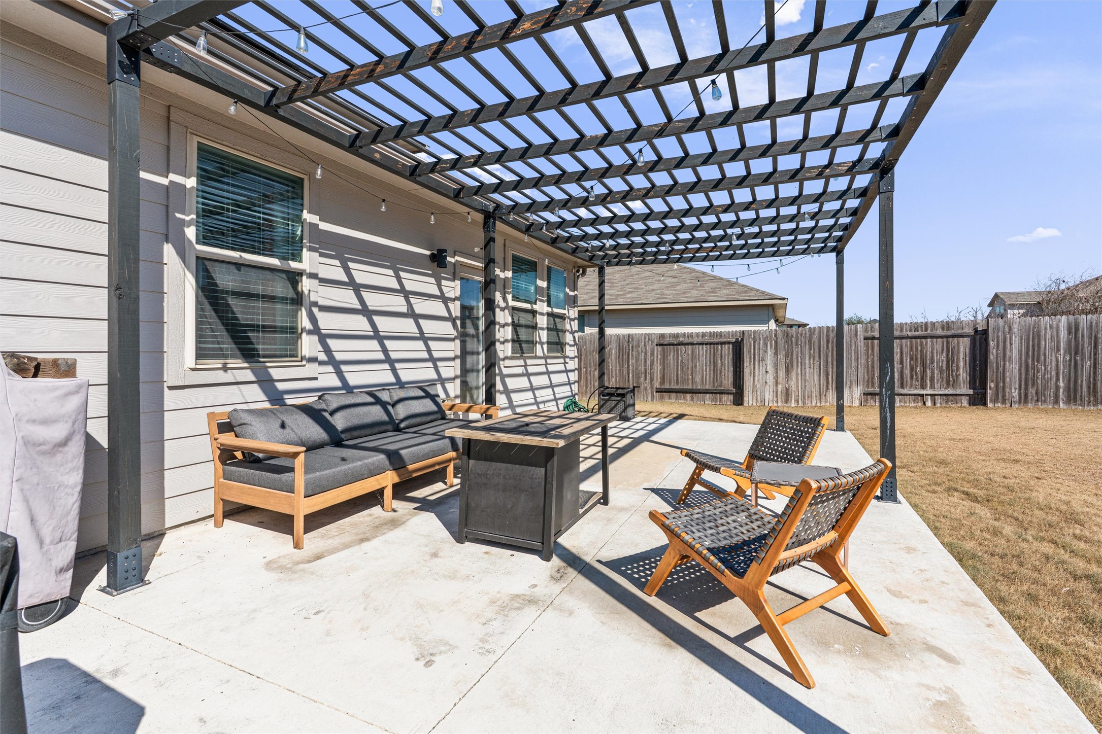 137 Red Sun Drive Kyle, TX 78640 - Photo 34 of 38 a roof deck with patio table and chairs
