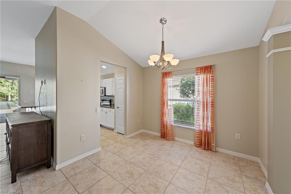 9996 Horse Creek Road Fort Myers, FL 33913 - Photo 12 of 44 a view of a livingroom with a chandelier