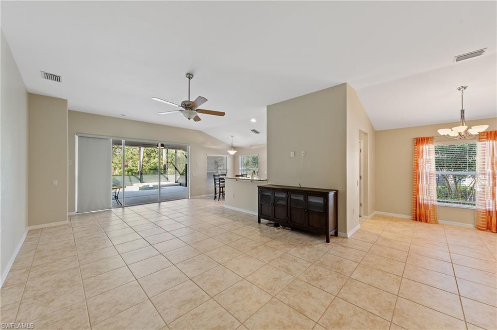 9996 Horse Creek Road Fort Myers, FL 33913 - Photo 14 of 44 a living room with furniture and a flat screen tv
