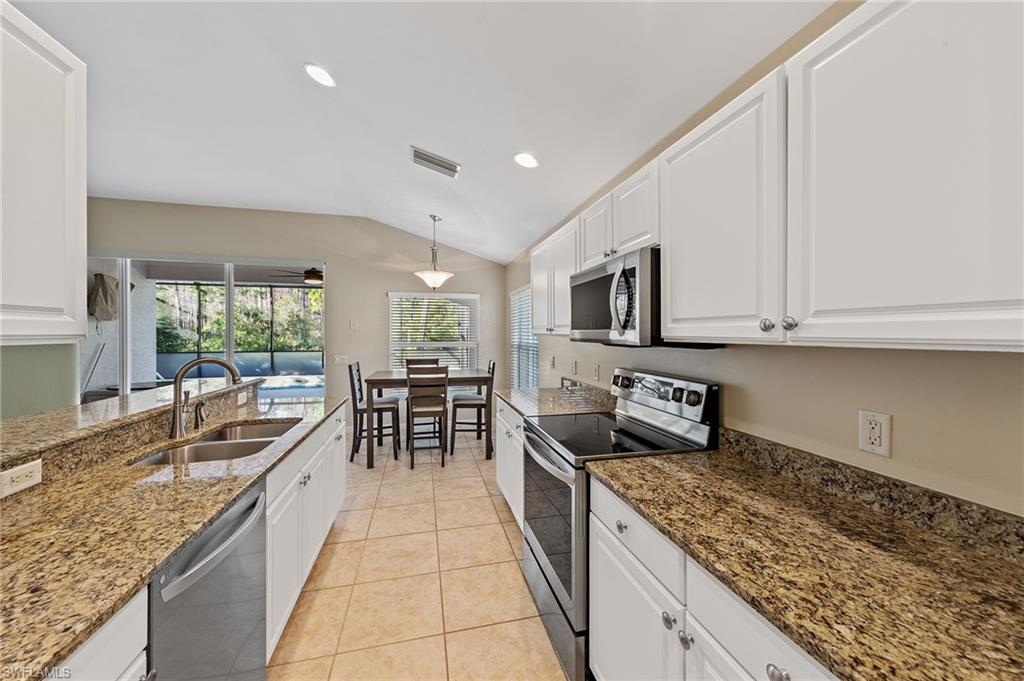 9996 Horse Creek Road Fort Myers, FL 33913 - Photo 20 of 44 a kitchen with granite countertop lots of counter top space