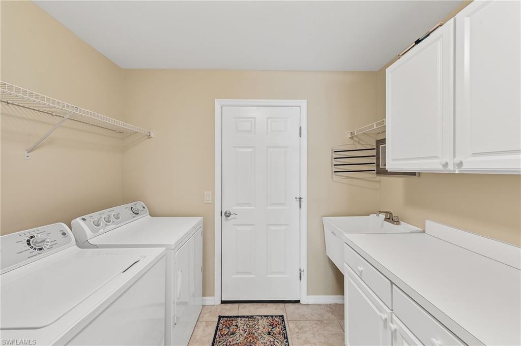 9996 Horse Creek Road Fort Myers, FL 33913 - Photo 22 of 44 a utility room with dryer and washer