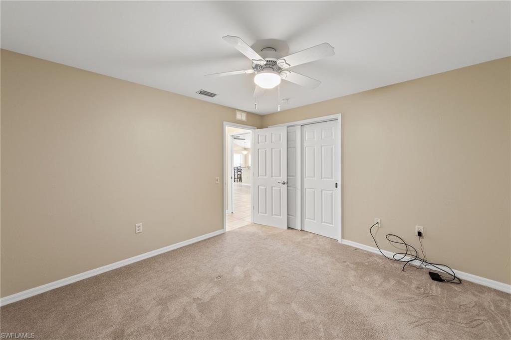 9996 Horse Creek Road Fort Myers, FL 33913 - Photo 24 of 44 a view of a livingroom with a fan