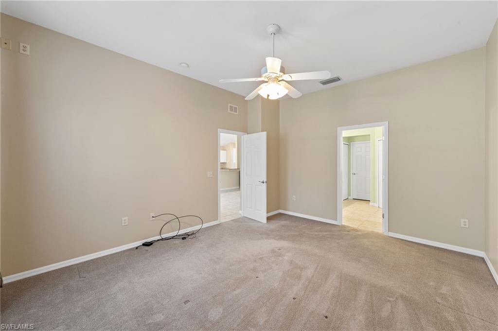 9996 Horse Creek Road Fort Myers, FL 33913 - Photo 27 of 44 an empty room with a view of a house
