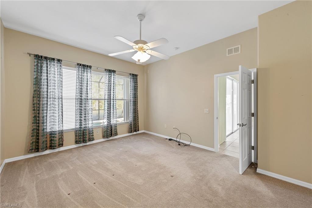 9996 Horse Creek Road Fort Myers, FL 33913 - Photo 28 of 44 a view of an empty room with a window