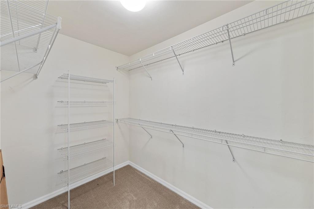 9996 Horse Creek Road Fort Myers, FL 33913 - Photo 31 of 44 a view of a room with racks on the wall