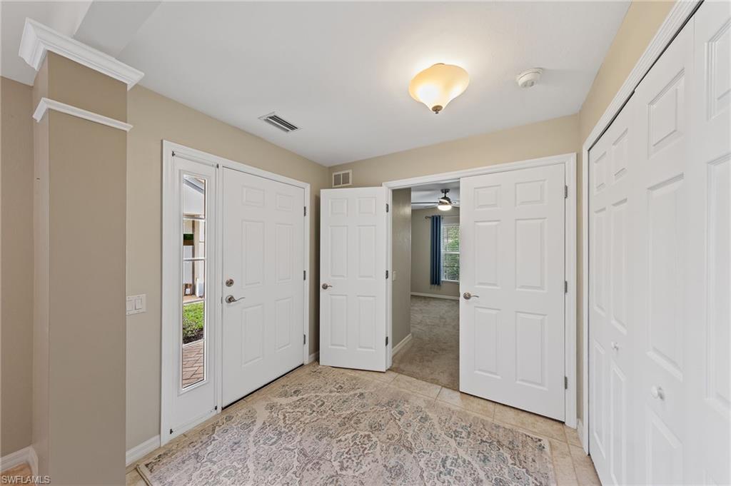 9996 Horse Creek Road Fort Myers, FL 33913 - Photo 9 of 44 a view of livingroom with hallway