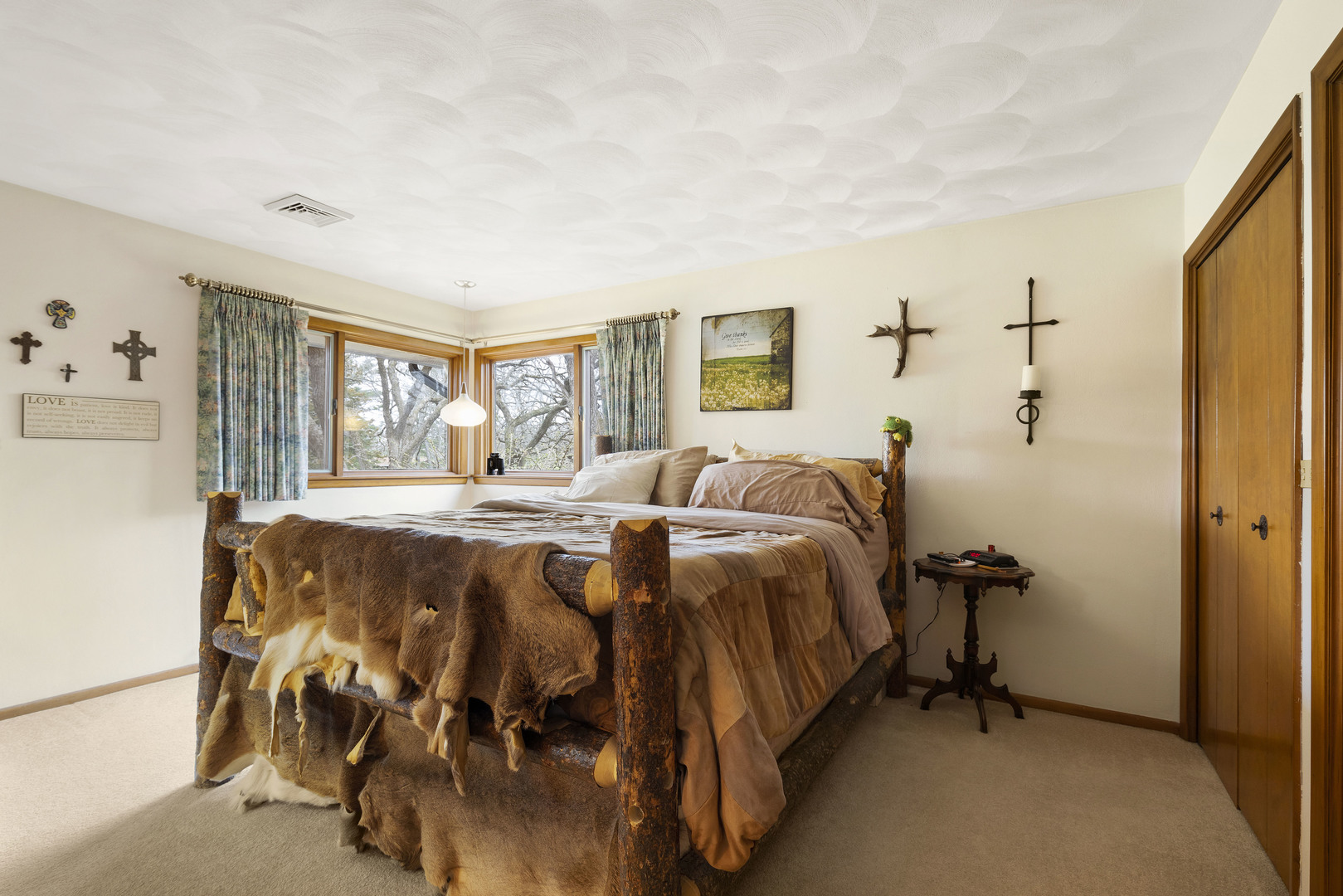 5812 Rotary Road Cherry Valley, IL 61016 - Photo 15 of 28 a spacious bedroom with a bed and a window