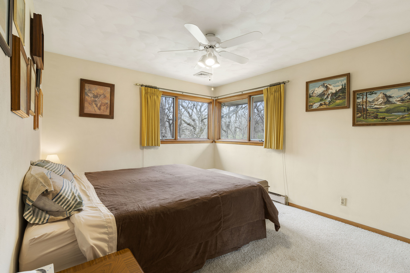 5812 Rotary Road Cherry Valley, IL 61016 - Photo 17 of 28 a bedroom with a bed and a couch