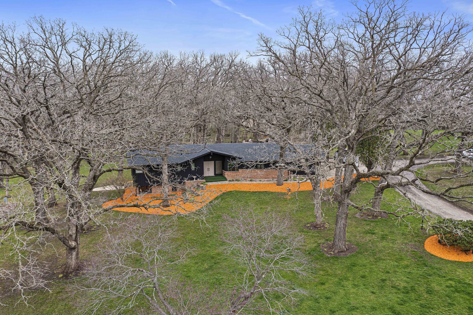 5812 Rotary Road Cherry Valley, IL 61016 - Photo 2 of 28 a view of a house with pool yard and outdoor seating