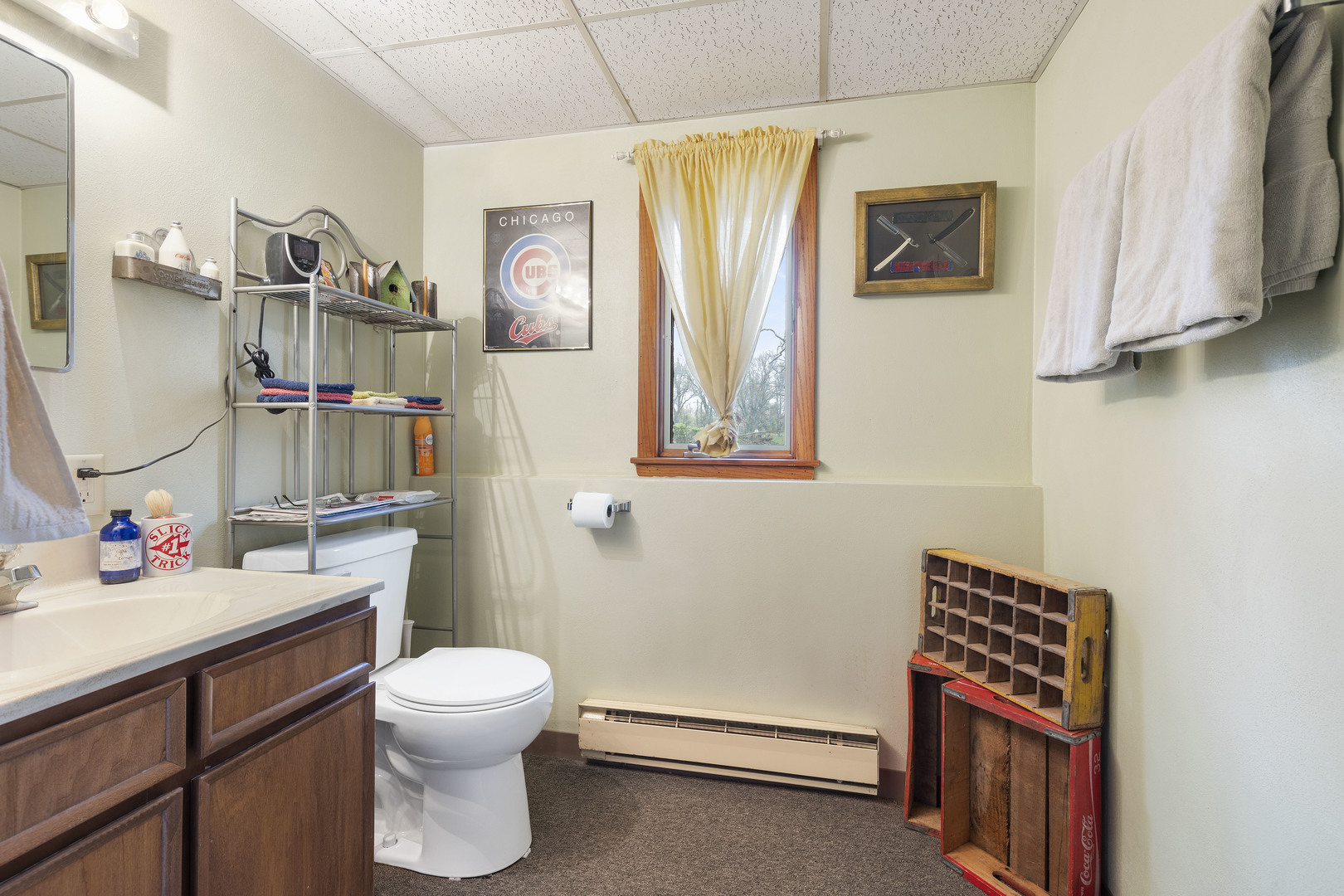 5812 Rotary Road Cherry Valley, IL 61016 - Photo 21 of 28 a bathroom with a sink toilet and shower