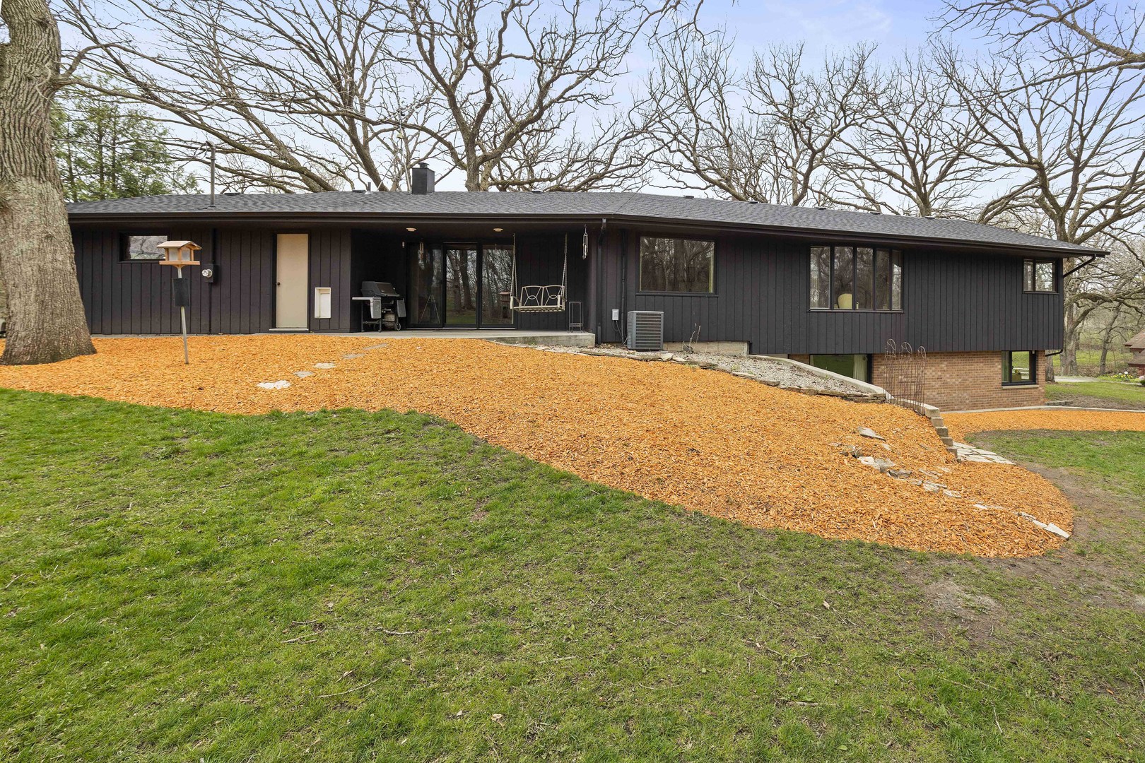 5812 Rotary Road Cherry Valley, IL 61016 - Photo 4 of 28 a front view of a house with a yard