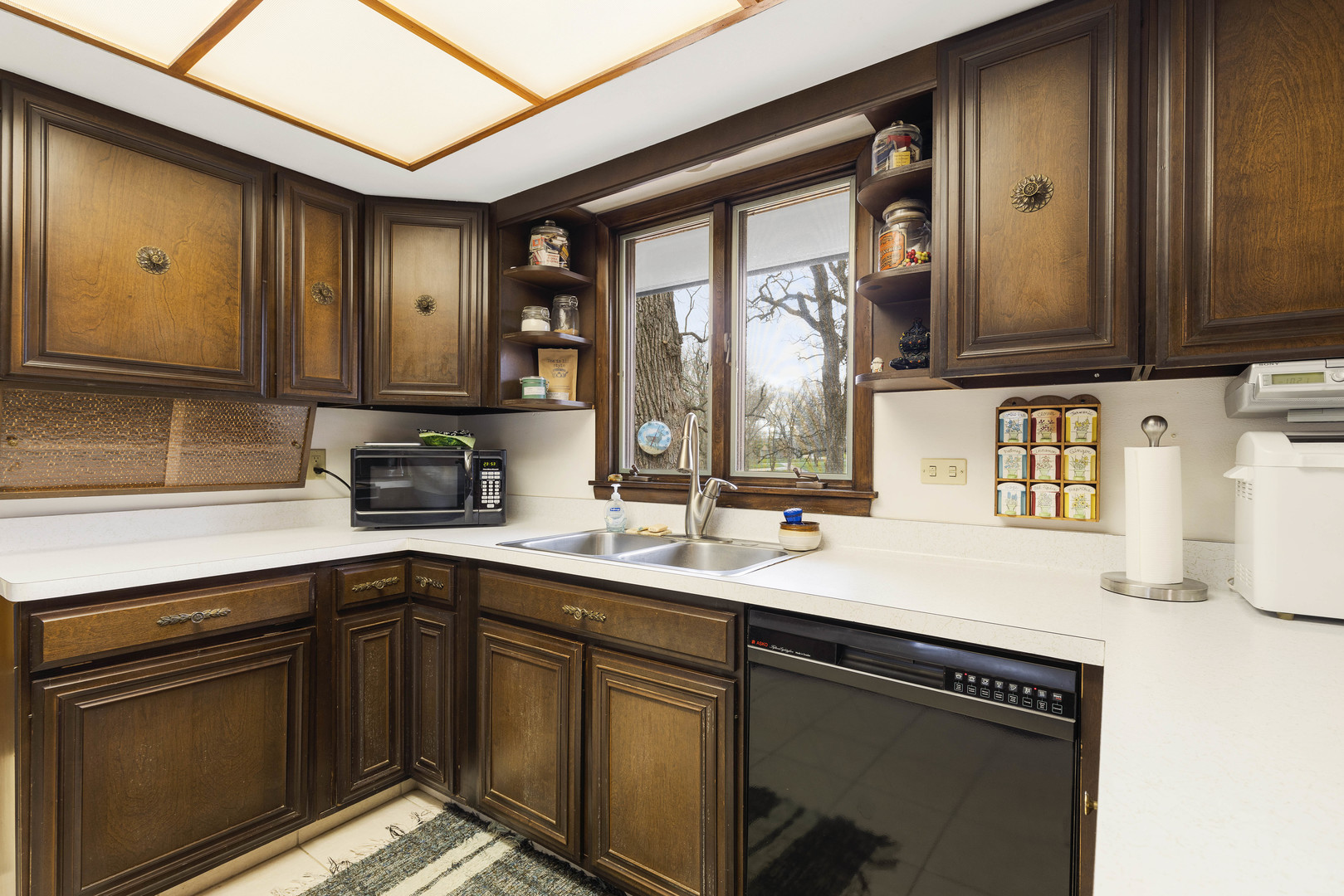 5812 Rotary Road Cherry Valley, IL 61016 - Photo 6 of 28 a kitchen with stainless steel appliances granite countertop a sink stove and cabinets