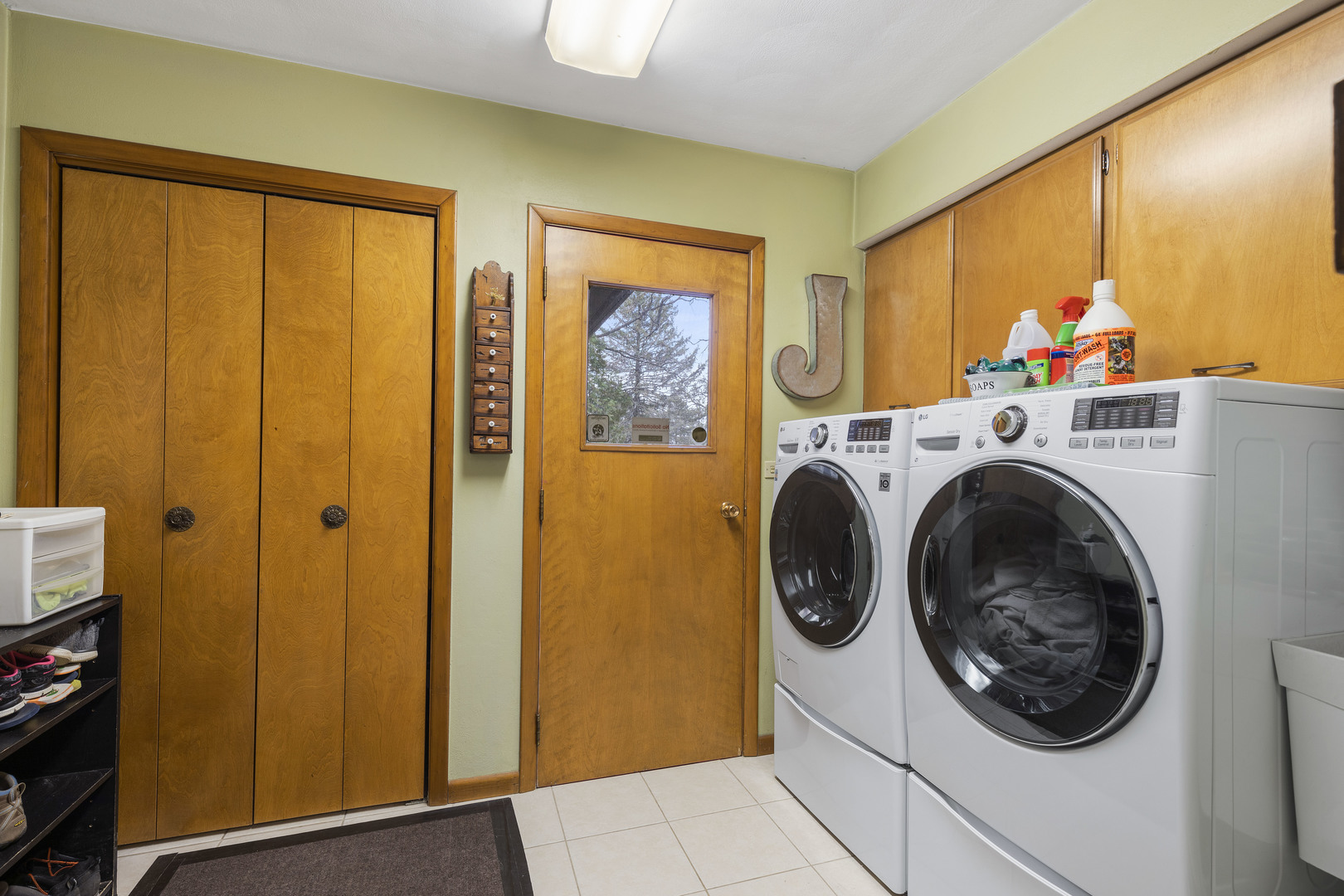 5812 Rotary Road Cherry Valley, IL 61016 - Photo 7 of 28 a view of a hallway with washer and dryer
