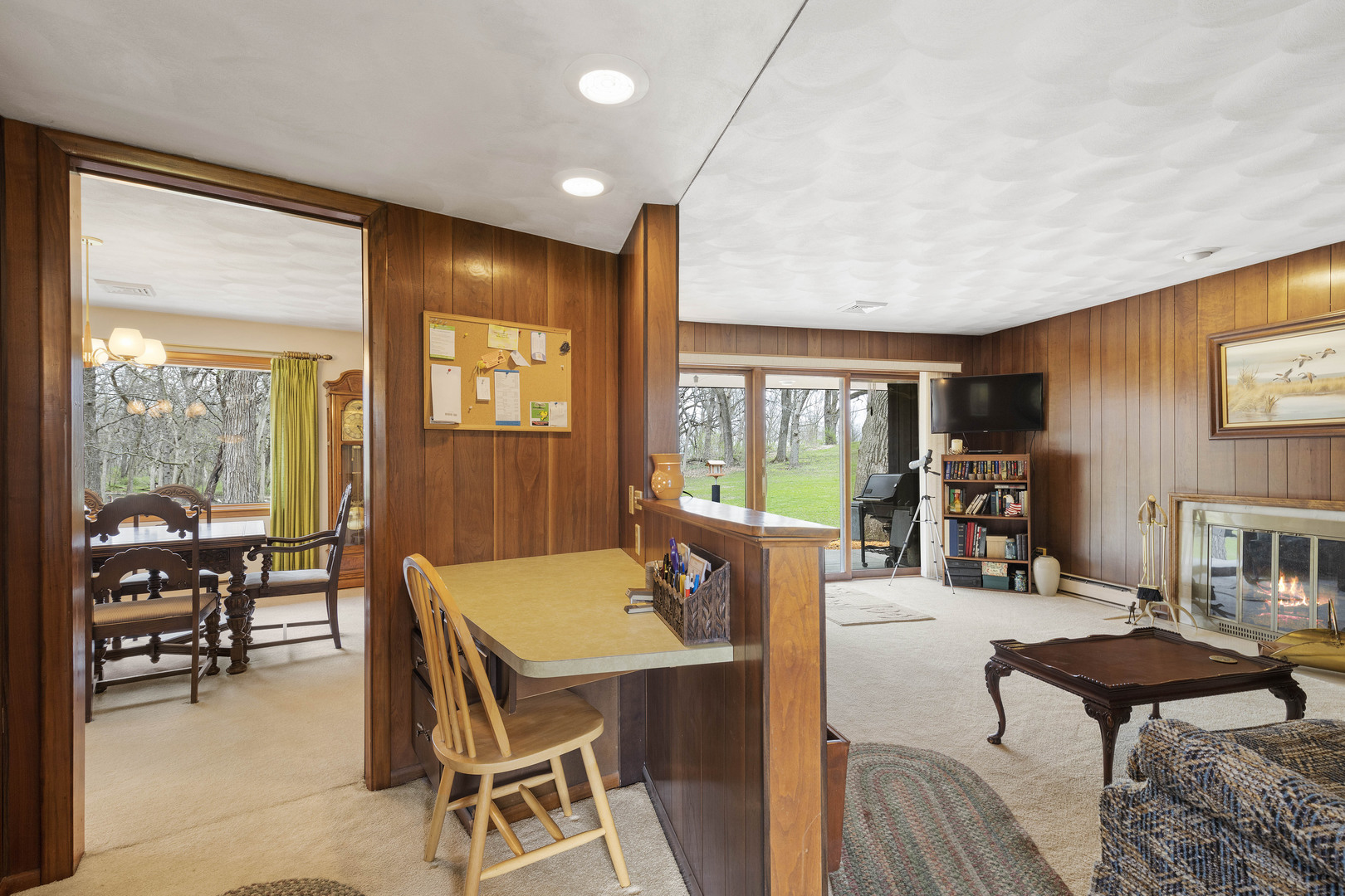 5812 Rotary Road Cherry Valley, IL 61016 - Photo 10 of 28 a living room with furniture a rug and a large window