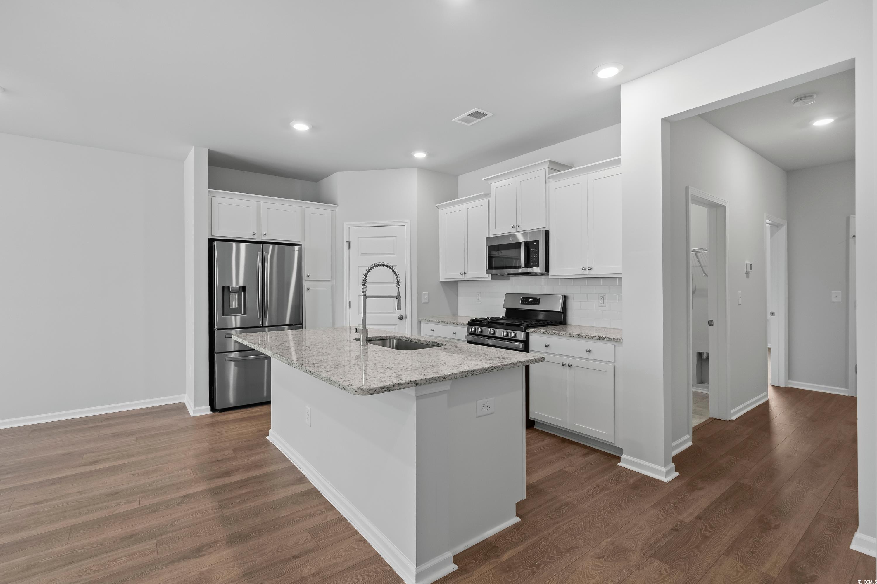 5310 Knobcone Loop, Unit B Myrtle Beach, SC 29577 - Photo 7 of 30 Kitchen with stainless steel appliances, a sink, d