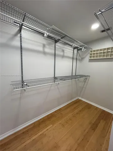 a view of a room with racks on the wall