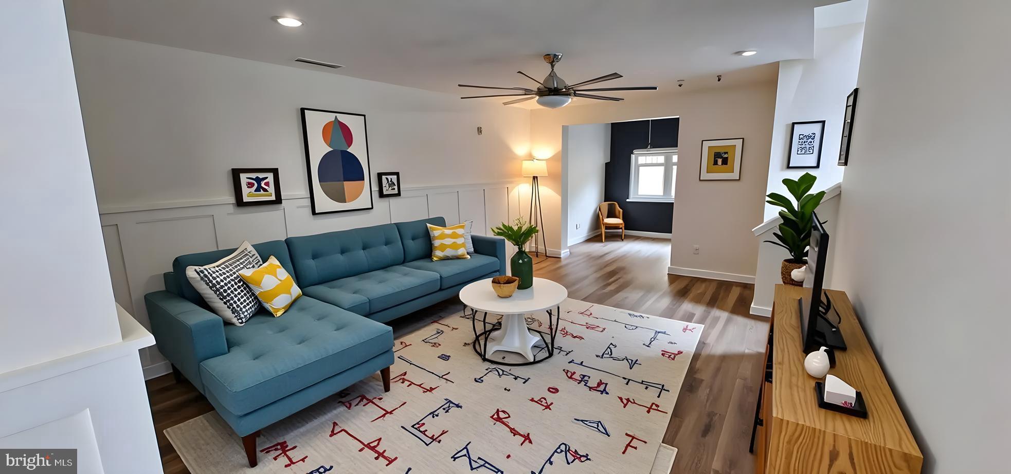 919 Lansdowne Road Middletown, DE 19709 - Photo 3 of 9 a living room with furniture and wooden floor