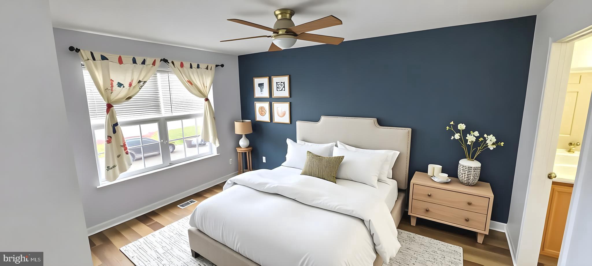 919 Lansdowne Road Middletown, DE 19709 - Photo 6 of 9 a bedroom with a bed and a window