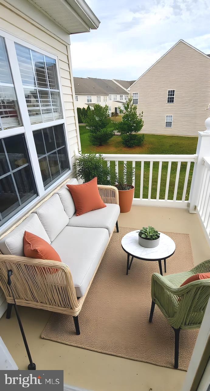 919 Lansdowne Road Middletown, DE 19709 - Photo 7 of 9 a outdoor sitting area with furniture and city view