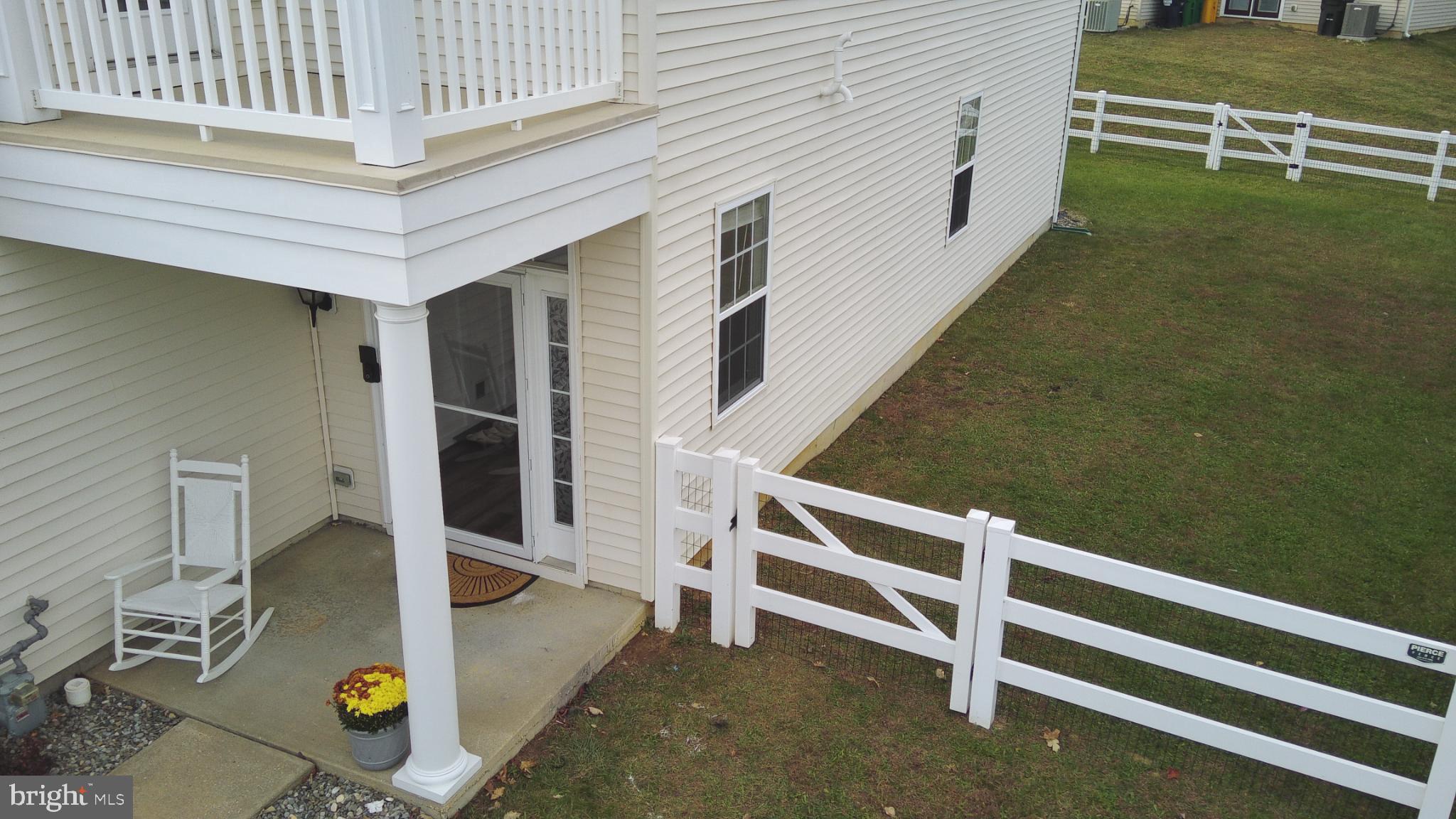 919 Lansdowne Road Middletown, DE 19709 - Photo 8 of 9 a view of backyard with seating area