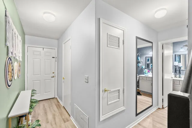 a living room with furniture fireplace and flat screen tv