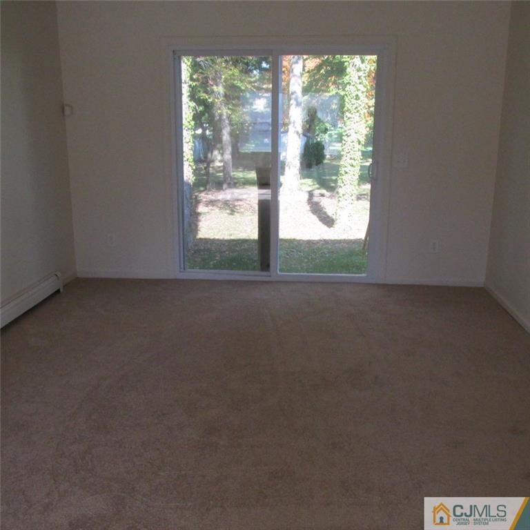 738 New Dover Road Edison, NJ 08820 - Photo 6 of 9 a view of a room with a large window