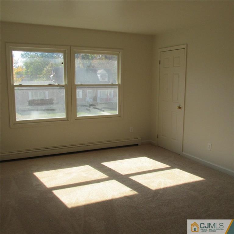 738 New Dover Road Edison, NJ 08820 - Photo 8 of 9 an empty room with a window