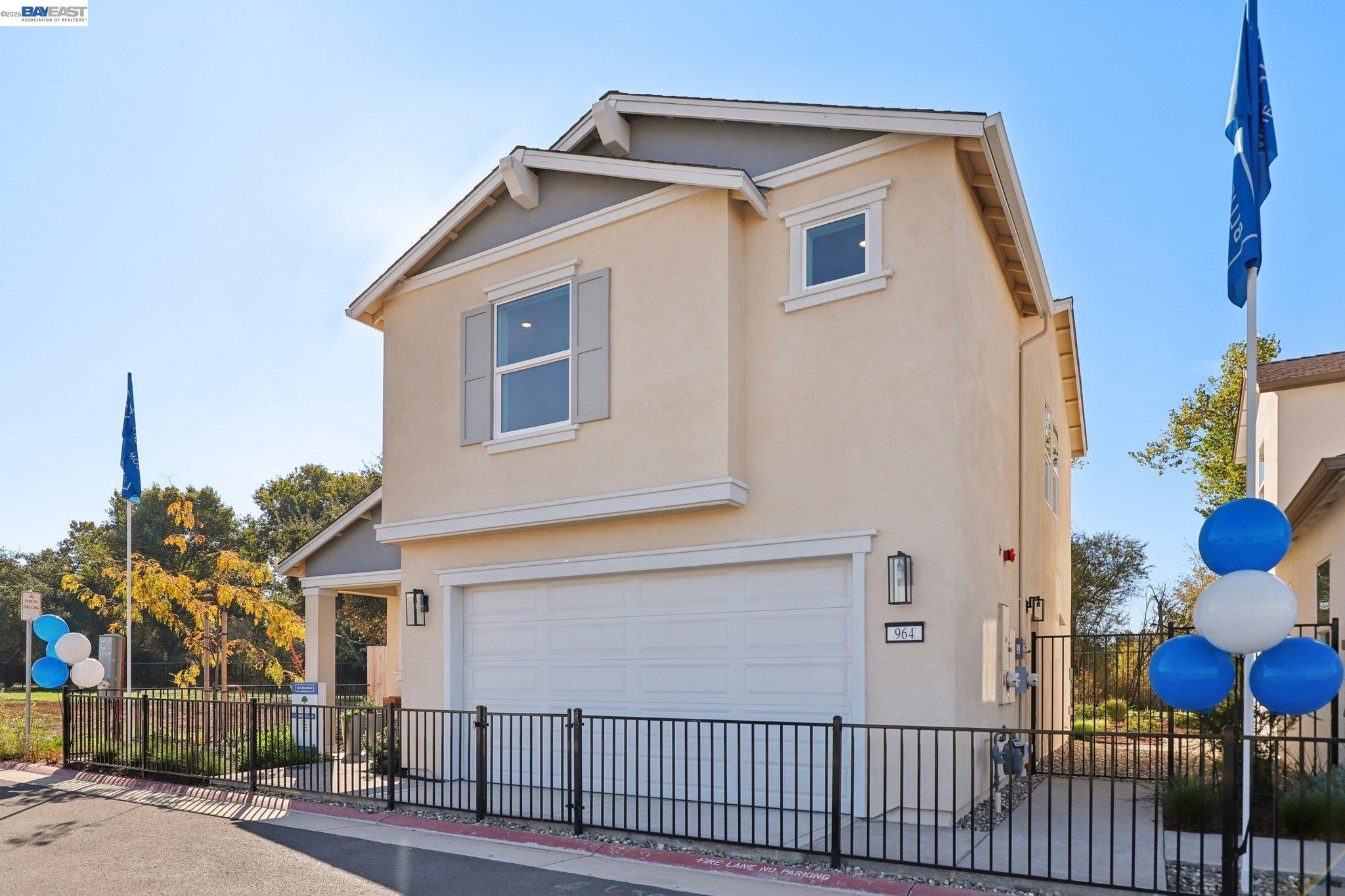 856 Pecan Tree Lane Galt, CA 95632 - Photo 2 of 30 a front view of a house with a yard