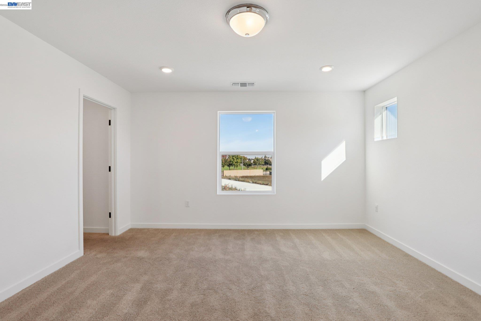 856 Pecan Tree Lane Galt, CA 95632 - Photo 24 of 30 an empty room with a window