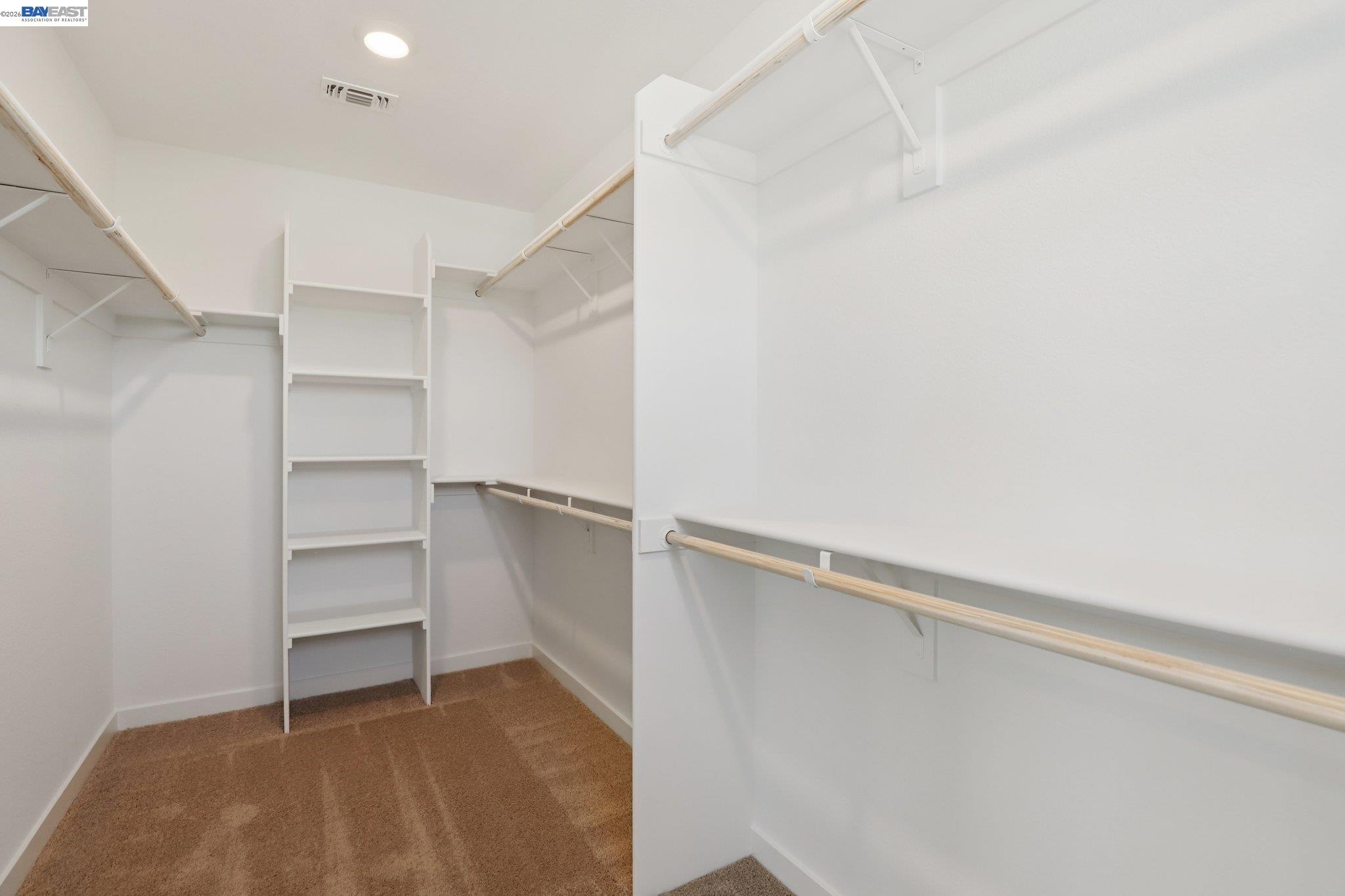 856 Pecan Tree Lane Galt, CA 95632 - Photo 27 of 30 a view of an empty walk in closet