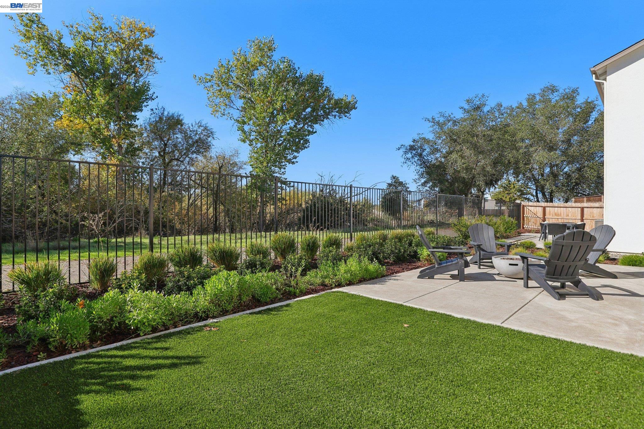 856 Pecan Tree Lane Galt, CA 95632 - Photo 30 of 30 a view of a chair and table on the garden