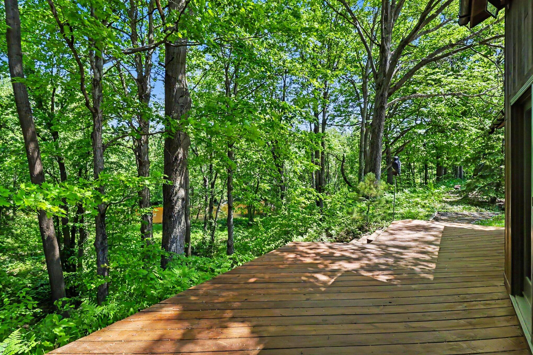 780 East Conrad Road Scottville, MI 49454 - Photo 22 of 34 Deck with river flowing