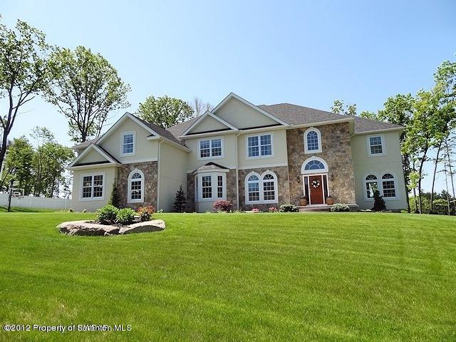 16 Windy Drive Shavertown, PA 18708 - Photo 1 of 22 a front view of house with yard and green space