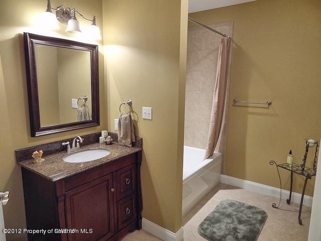16 Windy Drive Shavertown, PA 18708 - Photo 18 of 22 a bathroom with a granite countertop sink and a mirror