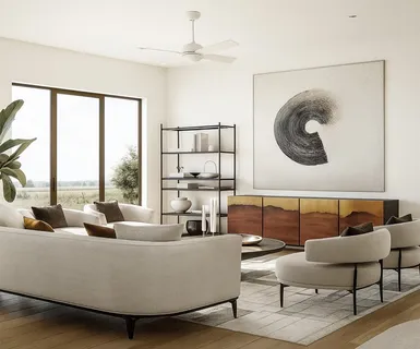 a living room with couches a coffee table and a chandelier