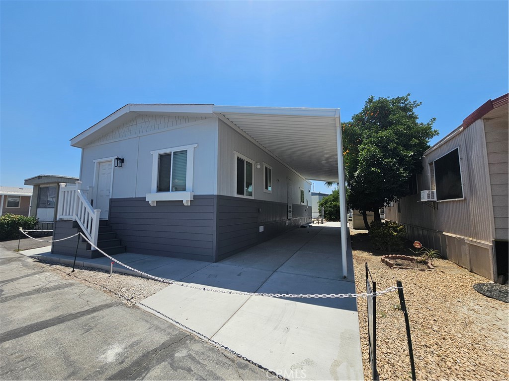 999 South Santa Fe Avenue, Unit 35 San Jacinto, CA 92583 - Photo 2 of 20 a house view with a outdoor space