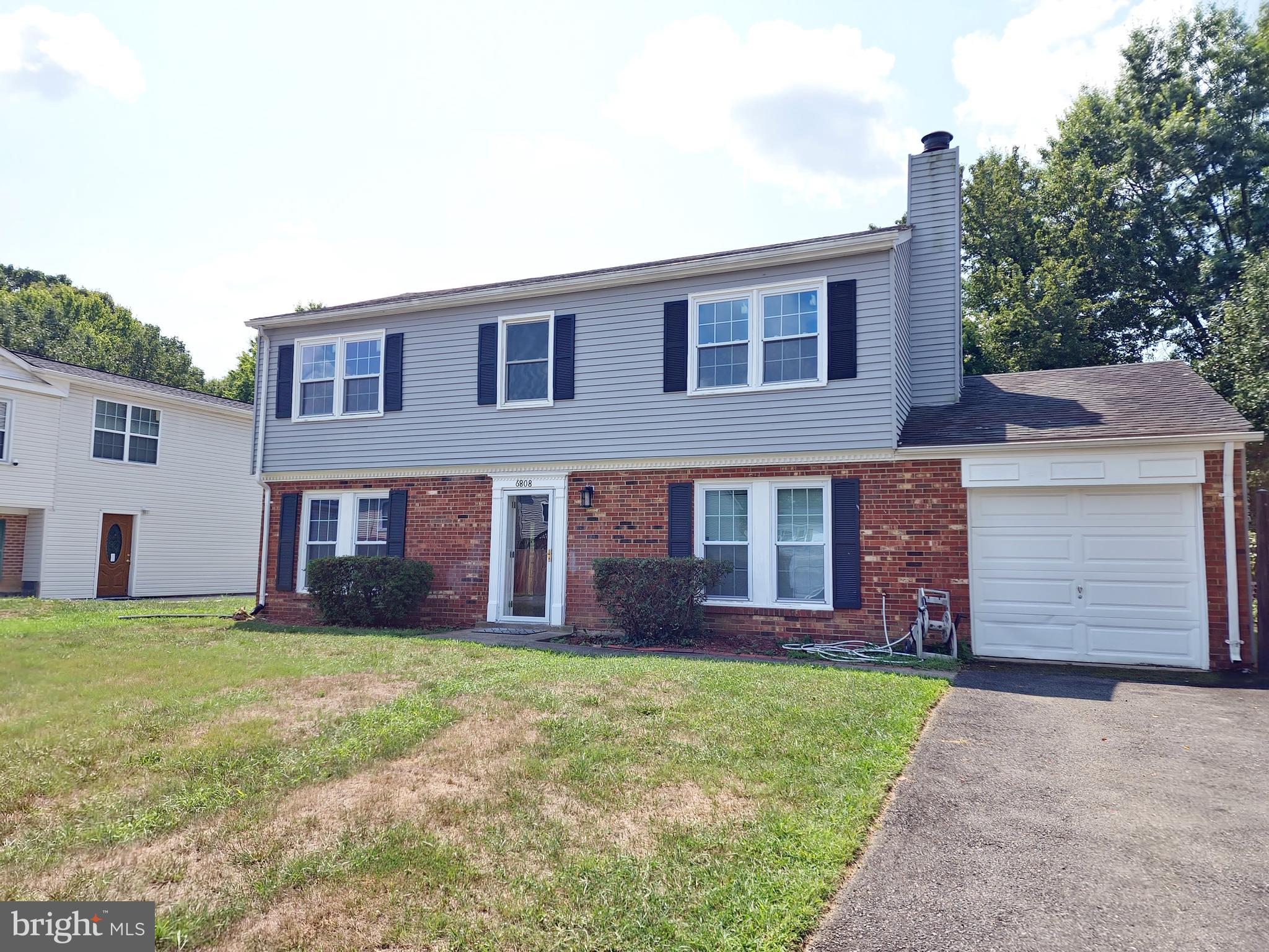 6808 Ben Franklin Road Springfield, VA 22150 - Photo 1 of 34 a house view with a garden space