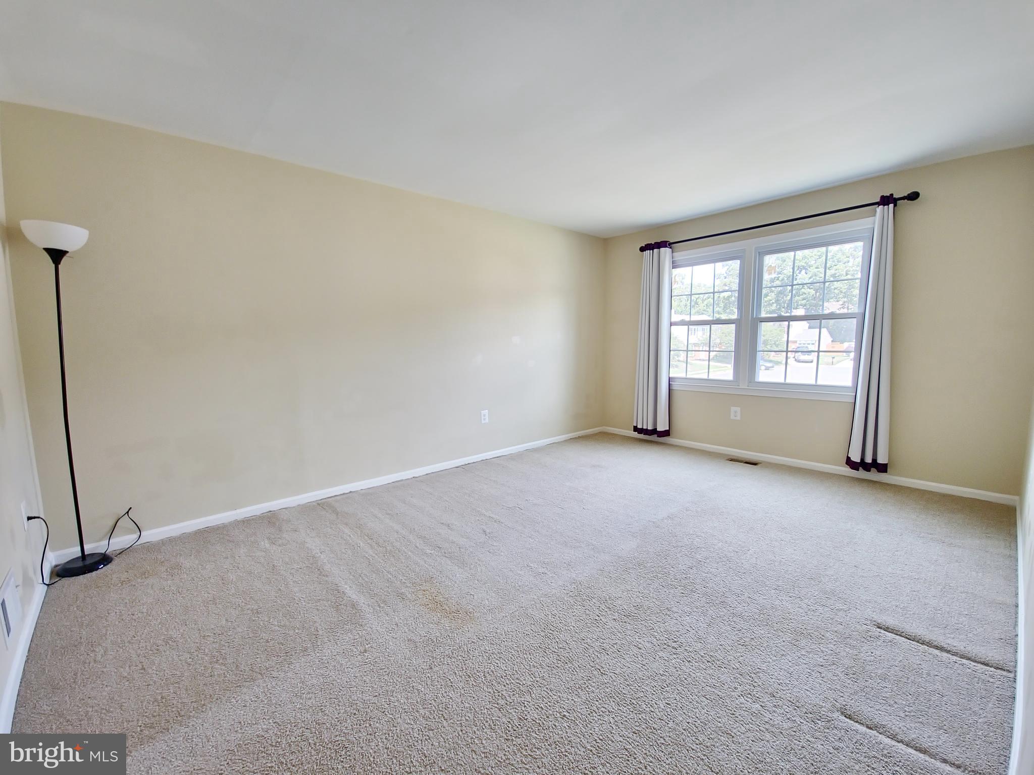 6808 Ben Franklin Road Springfield, VA 22150 - Photo 14 of 34 a view of an empty room with a window