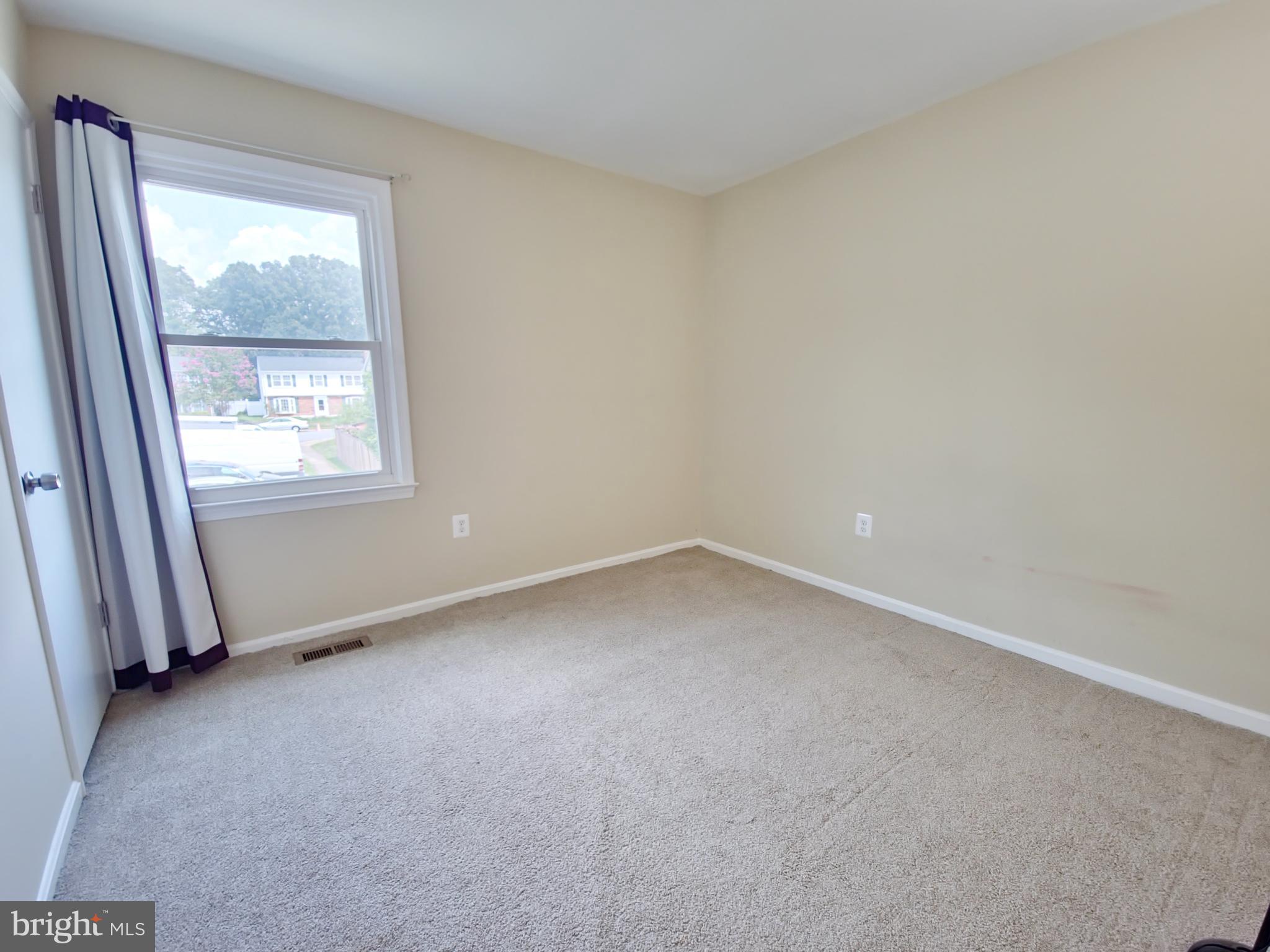 6808 Ben Franklin Road Springfield, VA 22150 - Photo 17 of 34 an empty room with a window