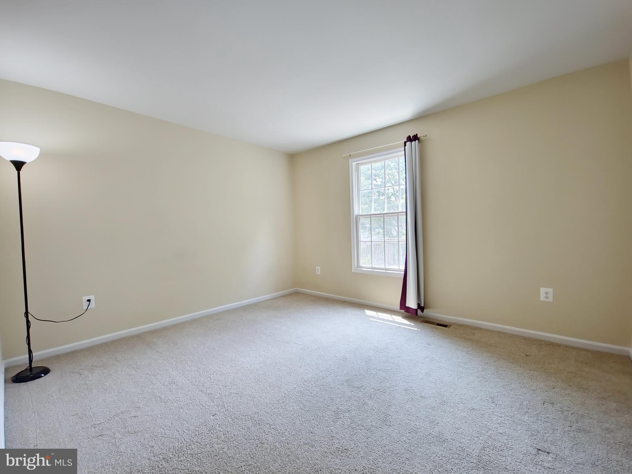 6808 Ben Franklin Road Springfield, VA 22150 - Photo 20 of 34 a view of an empty room with a window