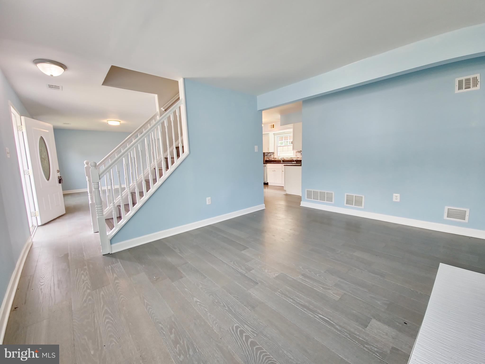 6808 Ben Franklin Road Springfield, VA 22150 - Photo 2 of 34 a view of entryway with wooden floor