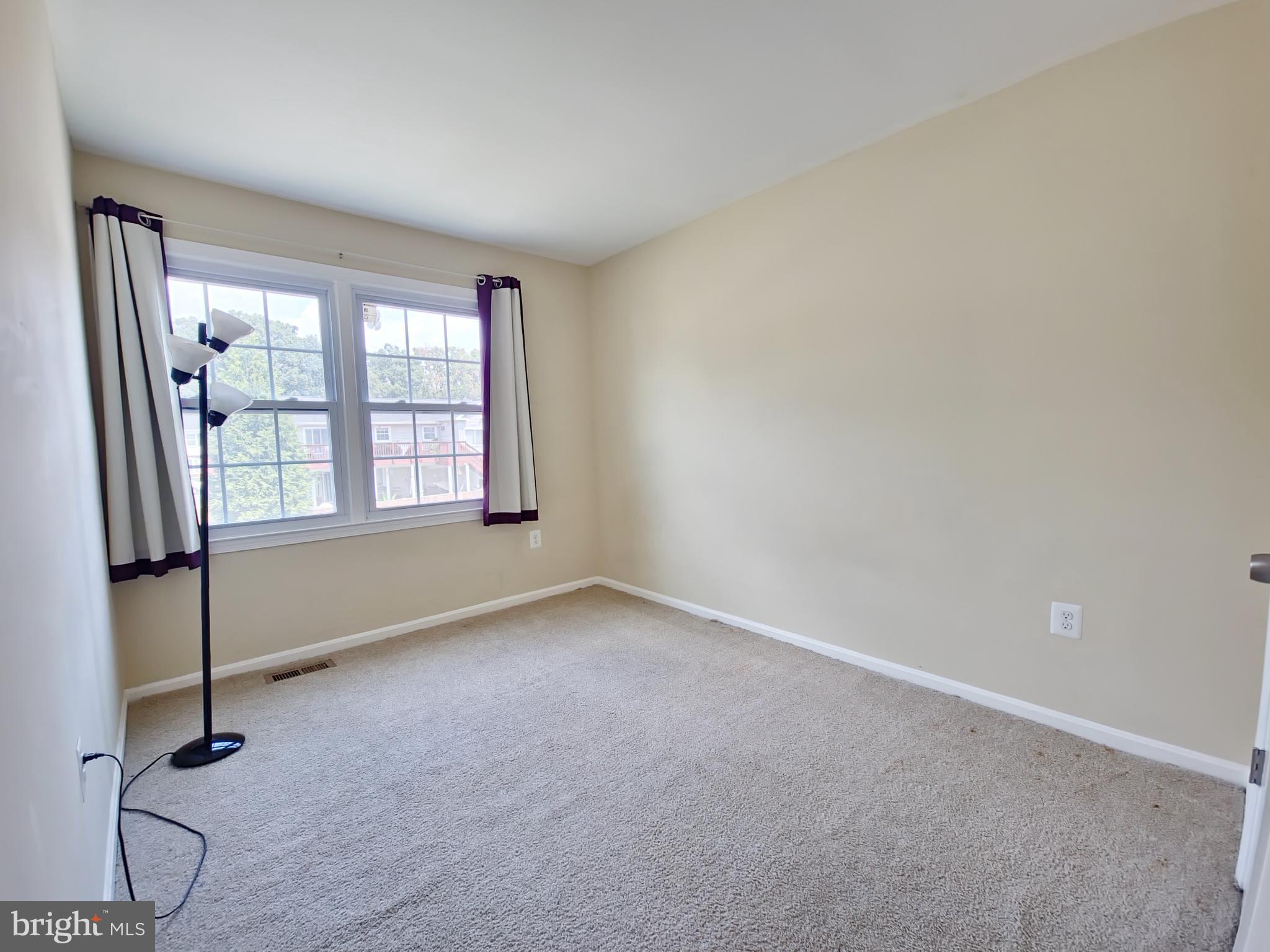 6808 Ben Franklin Road Springfield, VA 22150 - Photo 22 of 34 an empty room with windows