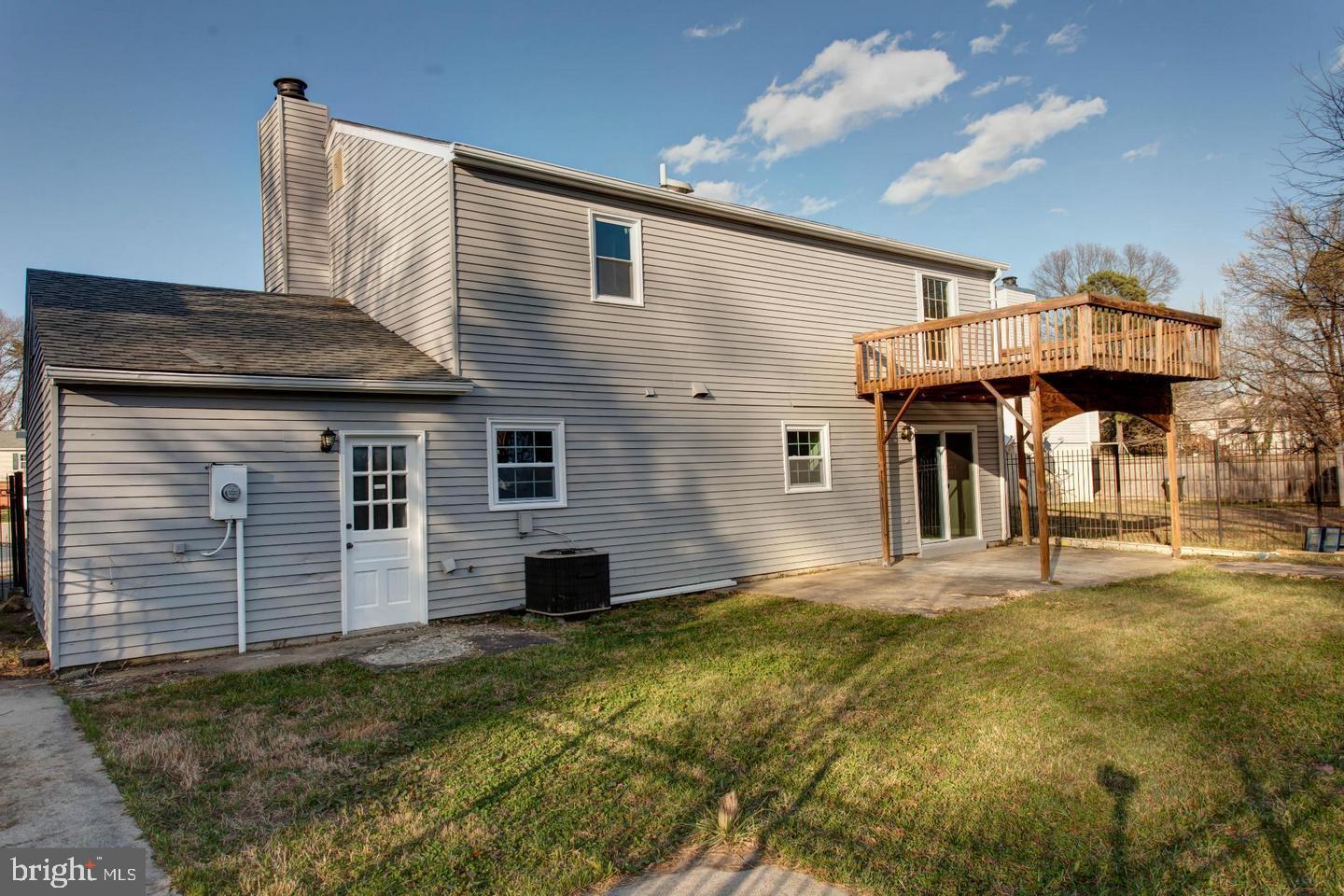 6808 Ben Franklin Road Springfield, VA 22150 - Photo 31 of 34 a front view of a house with a yard